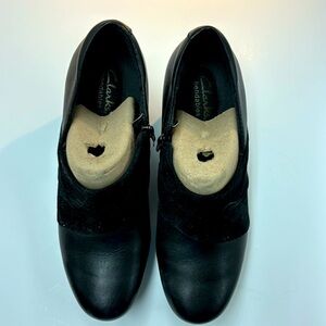 Clark’s black leather and suede shootie